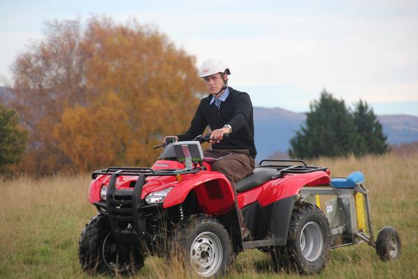 Otago/Southland's Pete Gardyne takes a pasture reading during the Technical Day of The National Bank Young Farmer Contest.